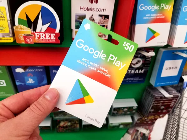 Google Play gift card in a hand – Stock Editorial Photo © dennizn #254479294